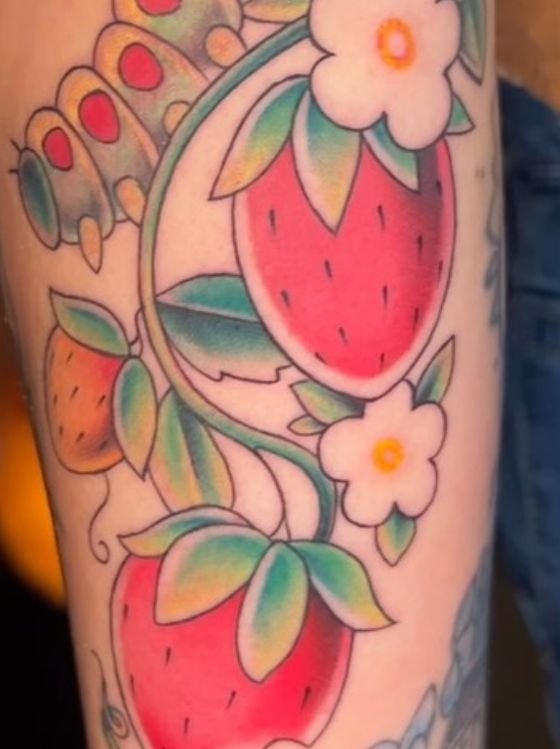 Neotraditional color strawberries and flowers tattoo